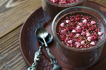 Chocolate panna cotta with cinnamon hearts and roses for Valenti