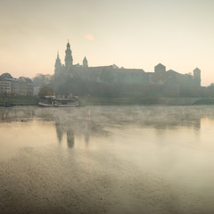 fog on the water before castle in Krakow