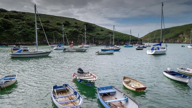epic timelapse shot filmed over 7 hours of  the port of Solva in Wales. during this long period of time the water empties out of the bay into the sea leaving the boats stranded in sand