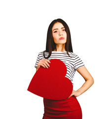 Portrait of young caucasian sexy woman with toy hearts in her hands with caprice emotional face. Studio  portrait isolated at white background.