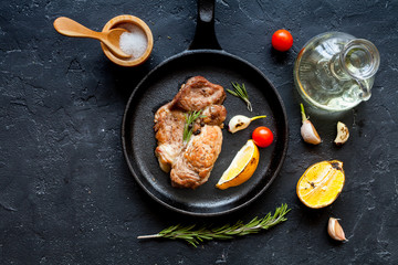 concept cooked steak on dark background top view