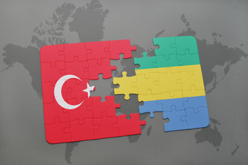 puzzle with the national flag of turkey and gabon on a world map