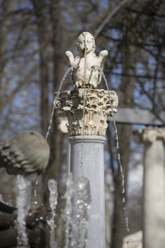 Sculpture of angel winged in the royal gardens of the palace of