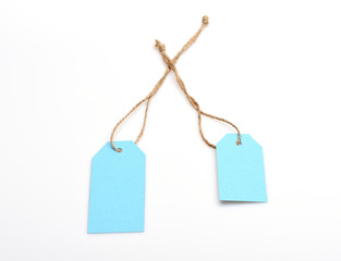 blue paper shopping tag isolated on white, copy space