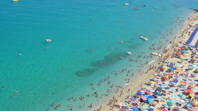 Tropea, Italy-  sea, sun, beach and bathers in a typical Italian seaside resort