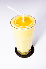 A glass of orange juice isolated on white background