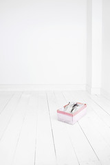 A brides white Wedding closed toe shoes in a box