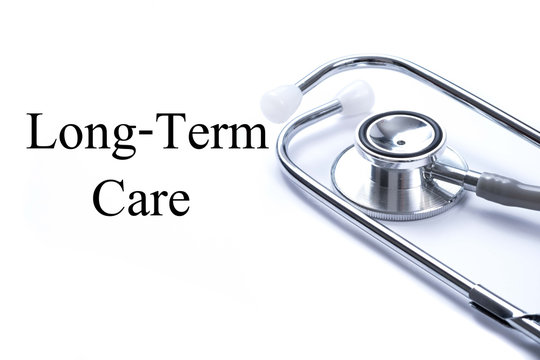 Page With Long Term Care On The Table With Stethoscope, Medical