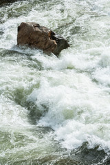 swirling water of the Merced River, Yosemite Nat'l Park, CA, USA