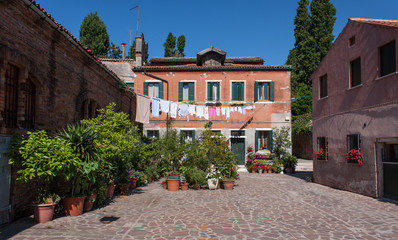 View of a small secluded piazza on Giudecca Island, Venice, Italy