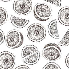 Seamless pattern of isolated hand drawn oranges in sketch style.