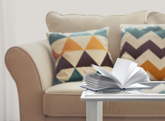 New open book on table in living room