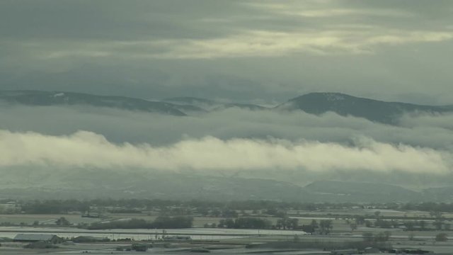 Snow and Ragged Clouds after Winter Storm in Rockies