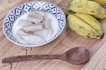 Cultivated banana in coconut milk and wholes of banana.