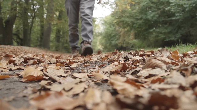 Low angle shot of a adult male walking