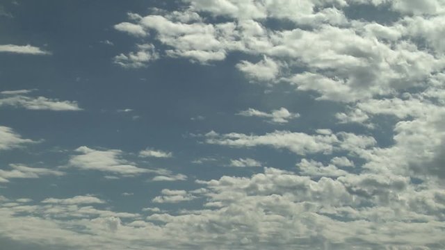 Altocumulus Clouds Decorate a Fair Summer Sky
