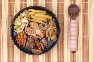 Fried teriyaki chicken with butter potato and herb.