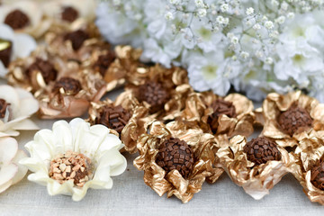 Decorative Candies and Pralines in Shiny Paper Wraps