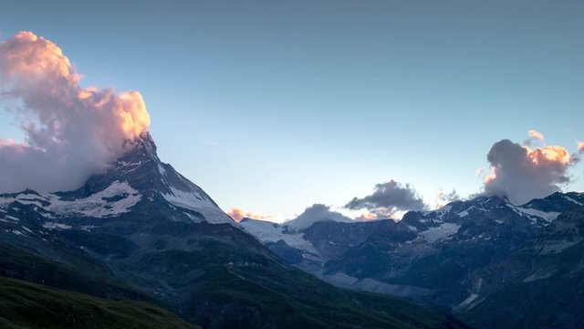 evening sunset time lapse of the amazing matterhorn mountain in the Swiss Alps.