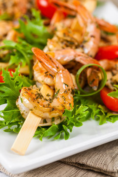 Grilled Shrimp Skewers Summer Healthy Salad. Selective focus.