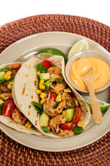 Shrimp Tacos with Corn and Avocado Salsa. Selective focus.