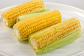 three prepared Corn on the cob