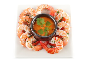 Prawns on a plate with garnish