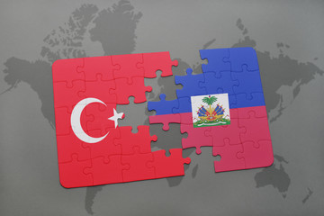 puzzle with the national flag of turkey and haiti on a world map