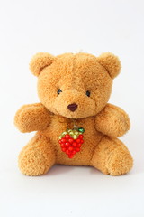 Brown teddy bear on a white background.