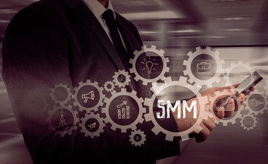 Business, technology, internet and networking concept. SMM - Social Media Marketing on the virtual display.