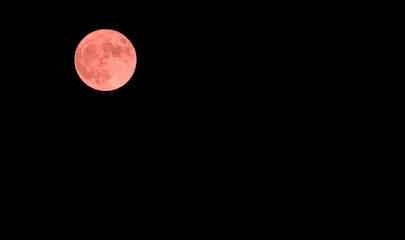 red moon in the dark sky on a mid night