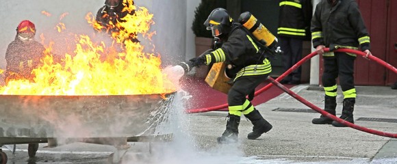 Firefighters during a training exercise off a huge fire