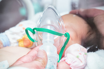 Nebulizer to a new born baby in hospital