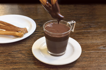 Photo of churros con chocolate, traditional Spanish dessert
