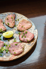 Barbecue sliced beef tongue marinated in pepper, onion, sesame oil and soy sauce.