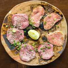 Barbecue sliced beef tongue marinated in pepper, onion, sesame oil and soy sauce.