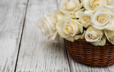 White roses in a basket