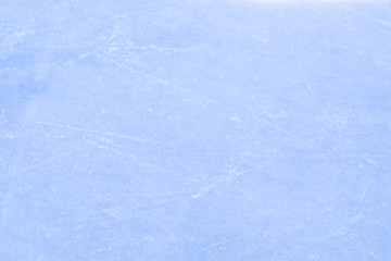 Top view of ice hockey or skating rink with traces from skates 