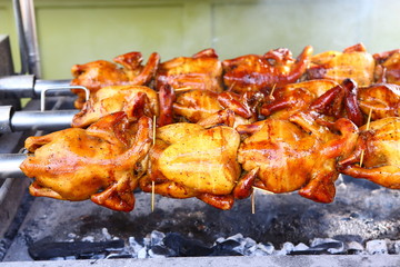 Rotating machine are grilled chicken, whole chicken.