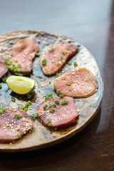 Barbecue sliced beef tongue marinated in pepper, onion, sesame oil and soy sauce.