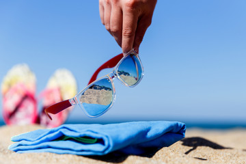 Man puts sunglasses on blanket