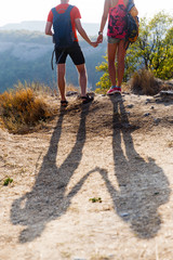 Shade of couple on hill