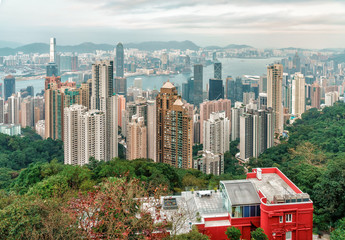 Victoria Harbour urban scenic panoramic landscape with skyscrapers skyline made from Victoria Peak on Hong Kong Island in Hong Kong city at daylight