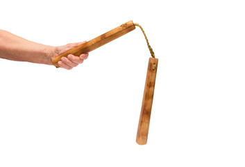 The hand with nunchacku. Isolated on white.