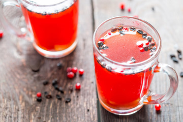 Red Berry Tea on the Wooden Table, warming and Delicious