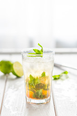 Alcoholic Mojito Cocktail isolated on a White Background with Free Space for Text, Vertical View
