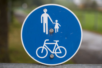 road sign informing pedestrians and cyclists