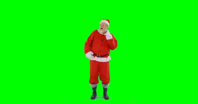Happy santa claus dancing against green background 4k