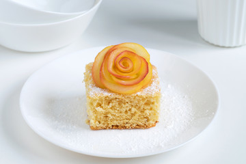 Cake with decoration of Apple on a white plate
