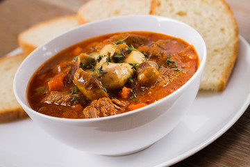 Hot stew with mushrooms